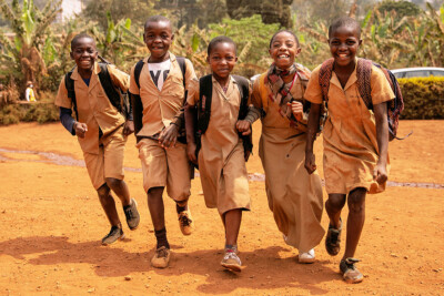 Children run in school playground