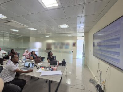 MoEST, TIE and EdTech Hub team review data dashboard to track Community of Learning content and attendance